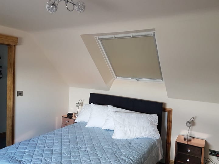 Elegant Velux Skylight Blinds in a Sunlit Room